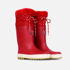 Red Muddy Puddles wellies, with white detailing and red fur trim. The wellies have red and white striped drawstrings.